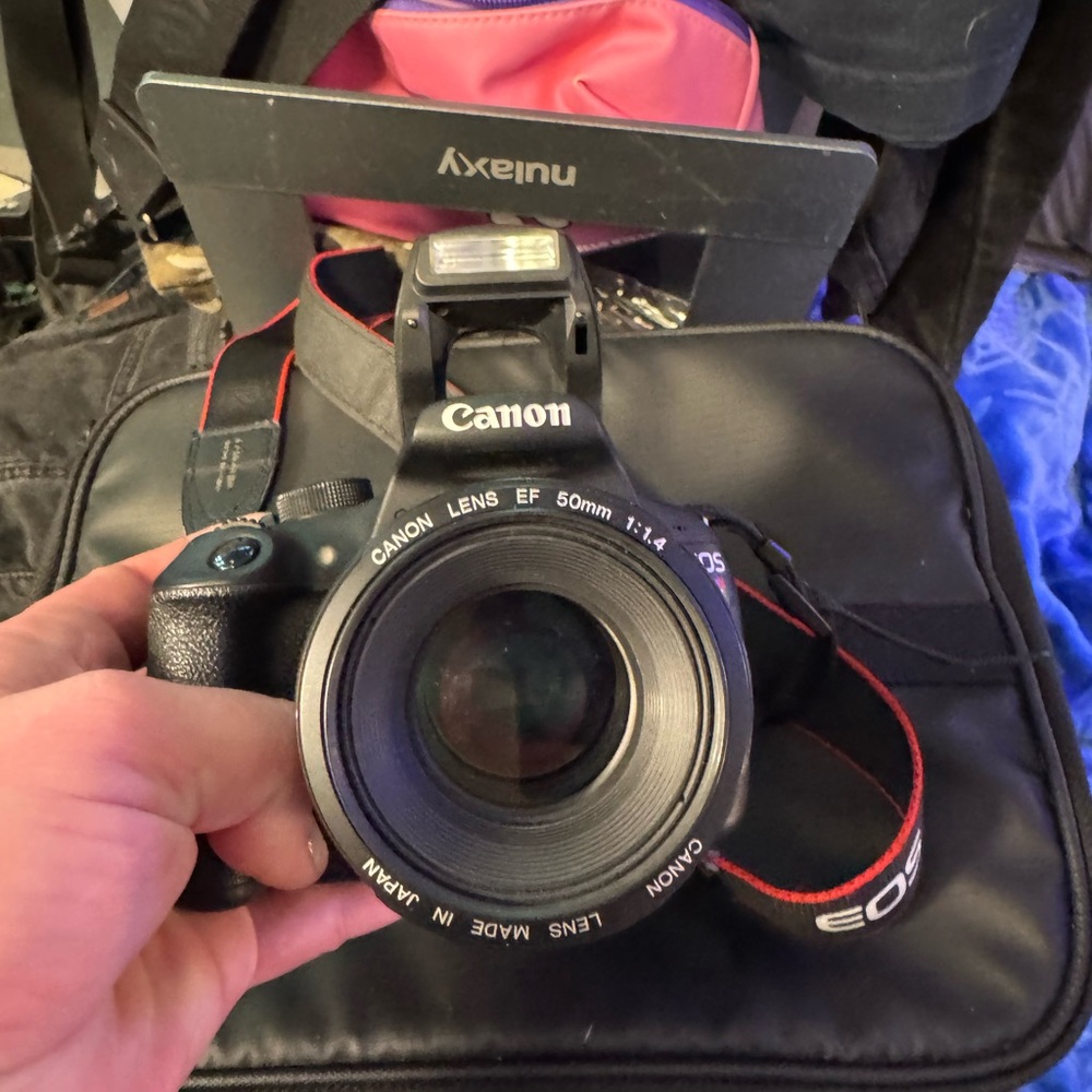 Canon Black and Red DSLR Camera